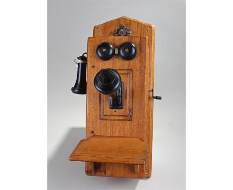 USA Cracraft-Leich wall hanging telephone, the oak case with hand set, twin bells and speaker, 60cm high