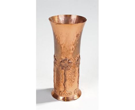 Keswick School copper vase, the arched top above a row of tall flowers, stamped KSIA to the base, 20cm high