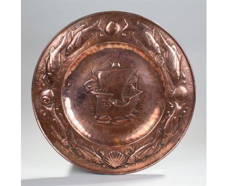 Newlyn copper charger, the centre with a galleon at sea and fish surround, signed to the back, 45cm wide