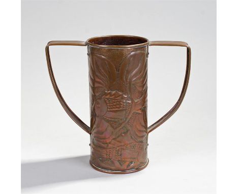 Newlyn style copper twin handled vase, decorated with fish swimming among seaweed, 20cm high