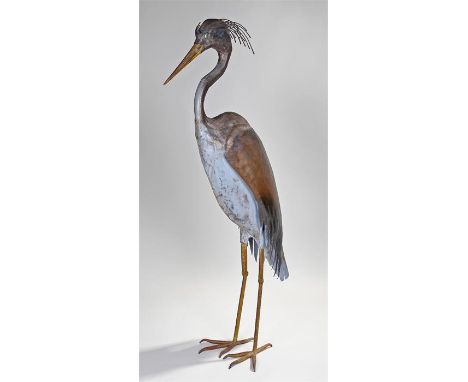 Large steel model of a Heron, with glass eyes and a rubbed effect yellow beak and grey body, 142cm high
