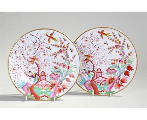 Flight Barr & Barr Worcester porcelain plates, decorated with reds, pinks, greens and yellow in the Chinese style with flying