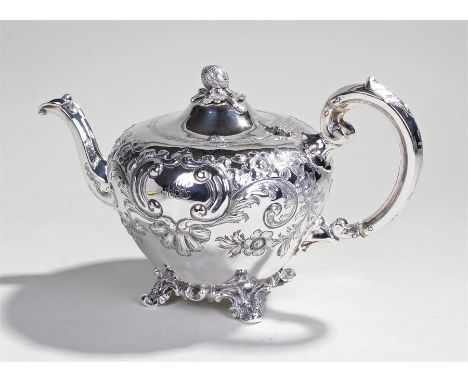 Victorian silver teapot, Sheffield 1853, maker J Mayer, the acorn finial top above a C scroll and blooming flower body raised