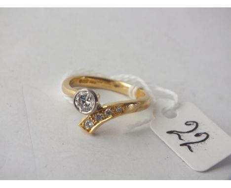 QUALITY 18CT GOLD &amp; DIAMOND CROSS  over ring with principle diamond weighing approx  0.50 carats size S         