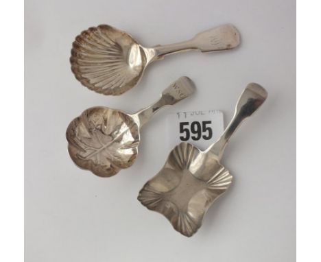 Exeter. Group of three various fiddle pattern caddy  spoons         
