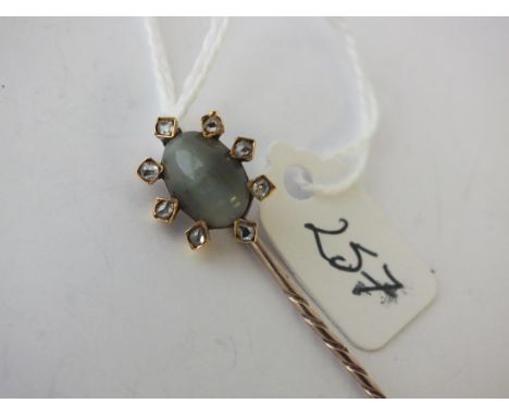 Cats eye and diamond gold mounted stick pin   