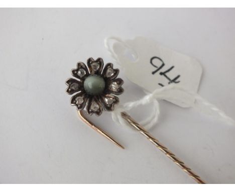 Flower stick pin set with rose cut diamonds    