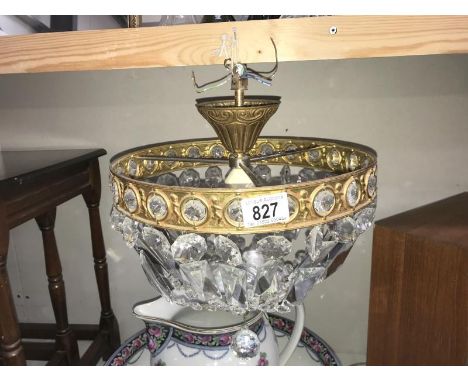 A glass dropper basket ceiling light