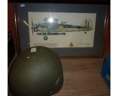 Framed print depicting Swordfish 11 Royal Navy historic flight and a Army tank crew helmet 