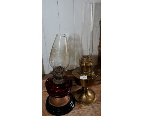 Copper oil lamp and a Victorian oil lamp with red glass reservoir and etched shade (2)