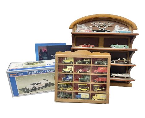 Franklin Mint 'The Classic Cars of the Fifties' collection with display rack, eleven (ex.12) die-cast models and folder of pa