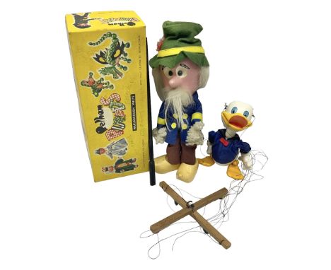 Two Pelham Puppets - The Magic Roundabout Mr. Rusty pole puppet with wool hands and blue  coat dated 1963; boxed; and Type SL