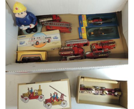 Fire related figures and vehicles to include two Wilesco figures in blister packs; modern tinplate fire engine model in box a