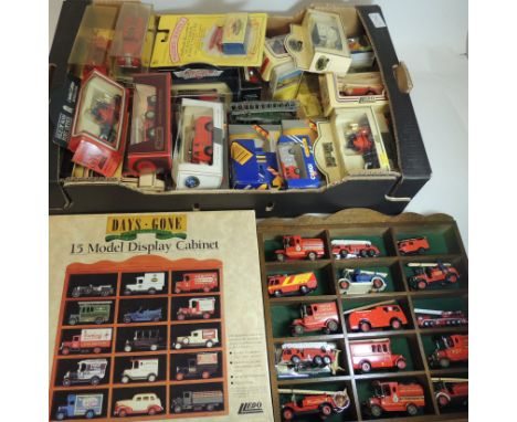 A quantity of boxed fire related vehicles, includes Corgi, Solido and Matchbox; Days Gone 15 model Display Cabinets and some 