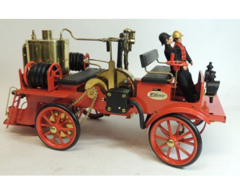 A Wilesco live steam fire engine with accessories and instructions, in original box