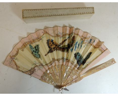 An Edwardian fan having plain mother of pearl sticks and guards and silk leaf painted with butterflies and with spangled deta