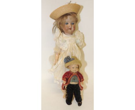 An Armand Marseille bisque socket head doll, marked made in Germany 390 A 4/0 xM and having blonde hair, sleeping blue glass 