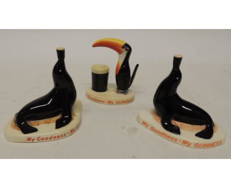 GUINNESS - Carlton Ware sealion ornament, red factory mark, 9.5cms high togther with a reproduction sealion by Copratec and a