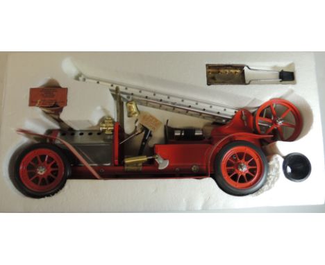 A Mamod live steam Fire Engine FE1 in original box with burner, pellets and funnel ++model vg,  box lid a bit distressed