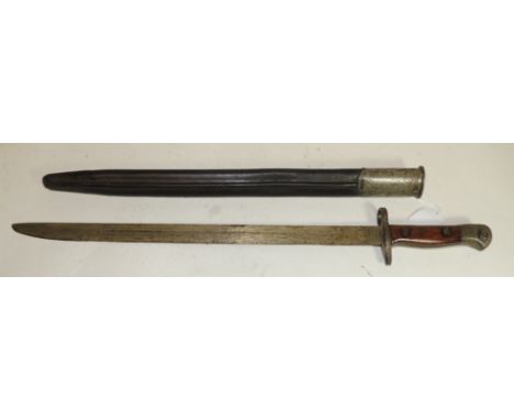 A bayonet with wood grip, straight blade and in black leather scabbard, blade 42.5cms long