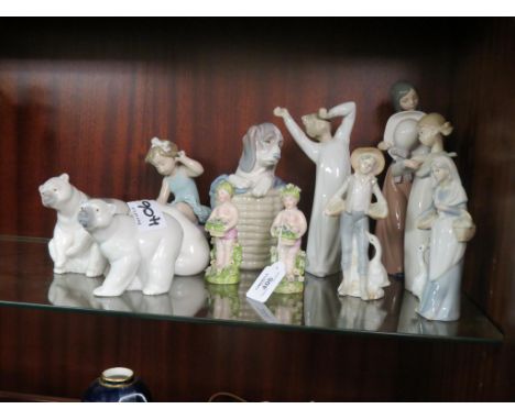Four Lladro figures, each a girl, tallest 9.5in., three Lladro polar bears and two Lladro dog models and four other porcelain