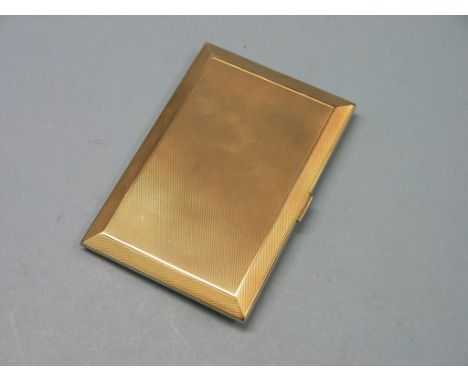 An engine-turned 9ct. gold cigarette case, 154.6 grams