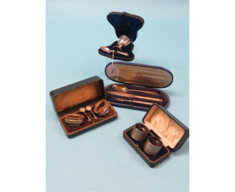 Cased sets of silverware, pair of late Victorian salts with servers, pair of heavy engine-turned napkin rings and a christeni