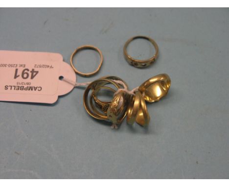 Seven various 18ct. gold rings, 23.1 grams gross total, two 15ct. gold rings, 6.6 grams gross total and a 12ct. gold ring, 1.