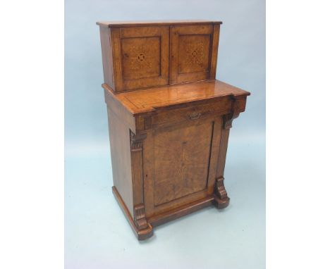 A Victorian inlaid burr walnut writing cabinet, stationery racks and two drawers enclosed by a pair of panelled cupboard door