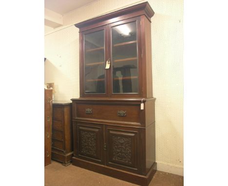 A Victorian mahogany secretaire bookcase, pair of glazed doors enclosing three adjustable shelves, secretaire drawer composed