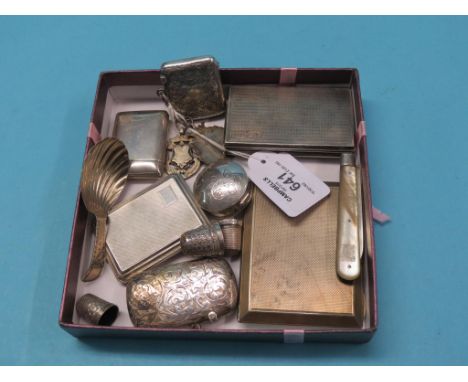 An early Victorian engraved silver case, Edward Smith, Birmingham 1843, together with four various silver vesta cases, enamel