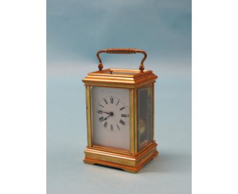 A French brass repeating carriage clock, with enamelled dial, 8-day movement striking on a gong, 6.75in.