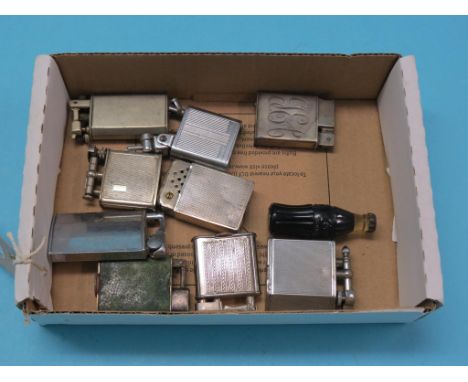 Ten various vintage cigarette lighters, including novelty Coca Cola bottle