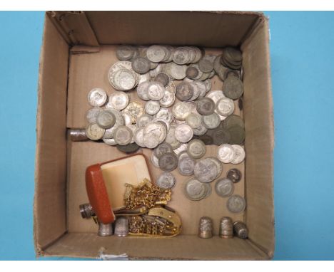 A collection of silver coins, including Florins, various thimbles, gate-link bracelet, etc.