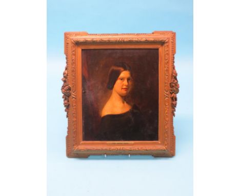 An oil on board, previously attributed to Ford Maddox Brown, portrait bust of a young lady, 12 x 10in., in moulded gilt frame