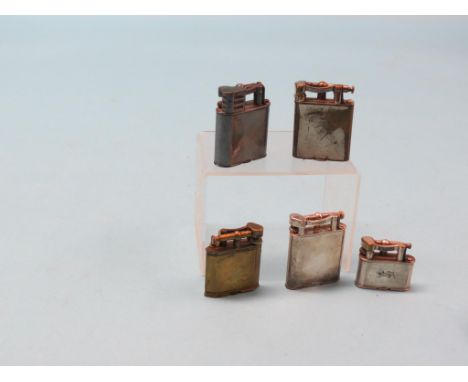 Five Dunhill vintage cigarette lighters