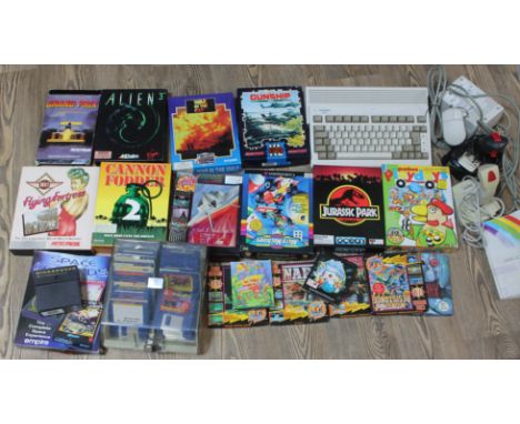 A Commodore Amiga A600 console and collection of games. 