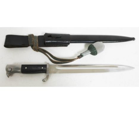 A WWII German parade bayonet with scabbard, frog and portepee.  