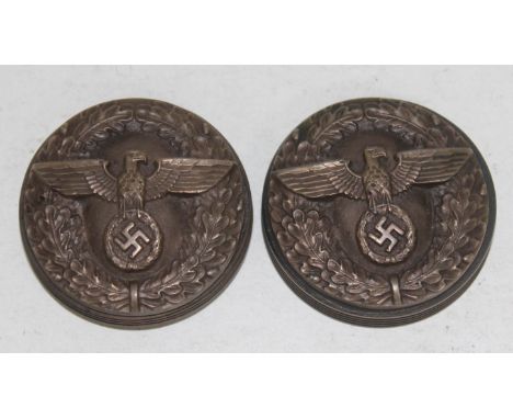 A snuff box, each side bearing German Swastika and eagle motif.  
