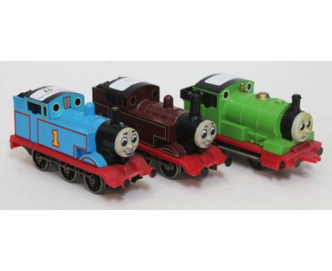 A group of three Thomas the Tank Engine 0 gauge models, possibly kit-built. 
