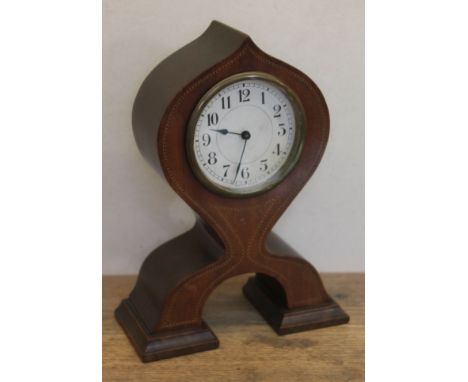 An Edwardian inlaid mahogany mantle clock, height 24.5cm.Condition: not currently running and wont be sold with any guarantee