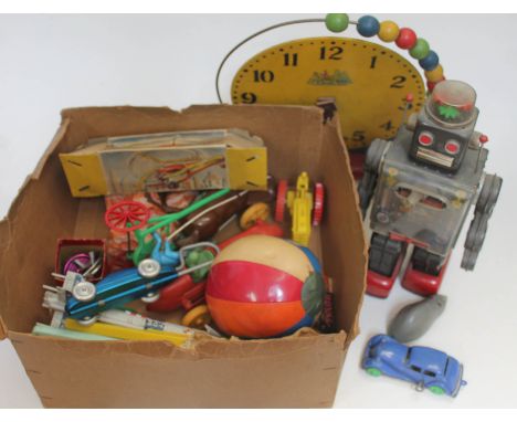 A box of vintage toys including a Tri-Ang Minic Toys clockwork mouse, a Japanese robot (no corrosion in battery compartment),