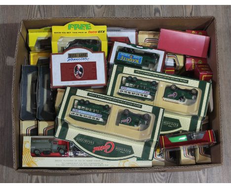 A collection of approx 63 boxed models vehicles including Lledo U.S. army collection, Days Gone Castrol sets, other Lledo Day