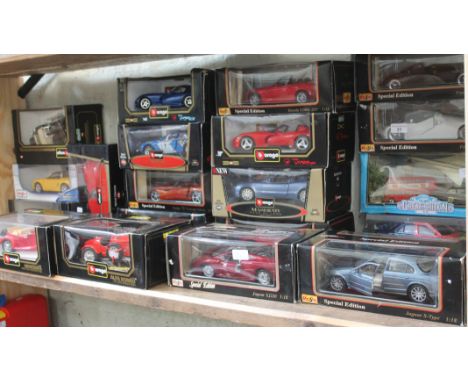 A collection of 20 boxed Burago, Maisto &amp; MCT 1:18 &amp; 1:16 scale die cast model vehicles and a boxed Corgi Big Ben tax