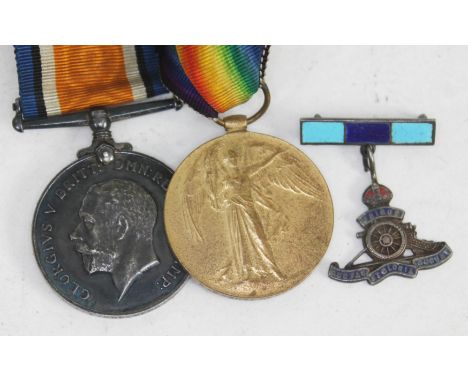 A WWI pair awarded to 74546 PTE A E SHELMERDINE MANC R and a lapel badge. 