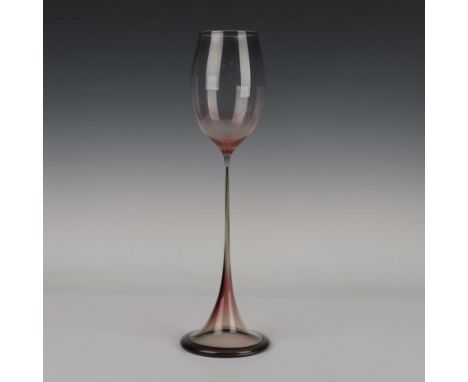 Dark pink with a flared base and a goblet formed top. Orrefors Expo etched on the base. Artist: Nils LandbergIssued: 1950sDim