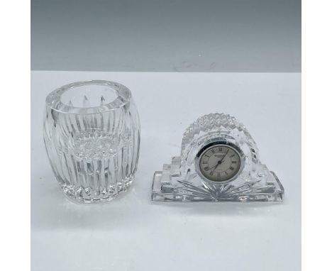 Beautiful clear crystal duo with facetted patterns resulting in a mesmerizing light display. Clock dimensions: 1.25''L x 4''W