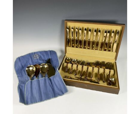 This grand set of gold-colored flatware includes 12 knives (9" L), 12 forks (7.75" L), 12 salad forks (6.5" L), 12 spoons (6"