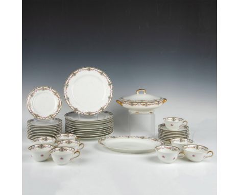 This fine porcelain set features a delicate pattern of flowers beautifully adorning the, enhanced by gold details. Includes: 