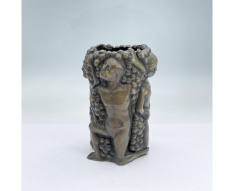 Open bronze vessel depicting scantily clad or nude men along a textured background. Each segment is separate and attached by 